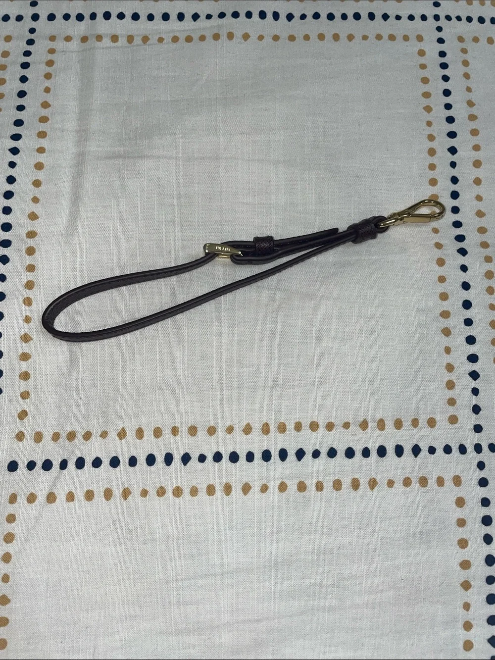 Prada burgundy Leather Wristlet Strap with Gold Hardware